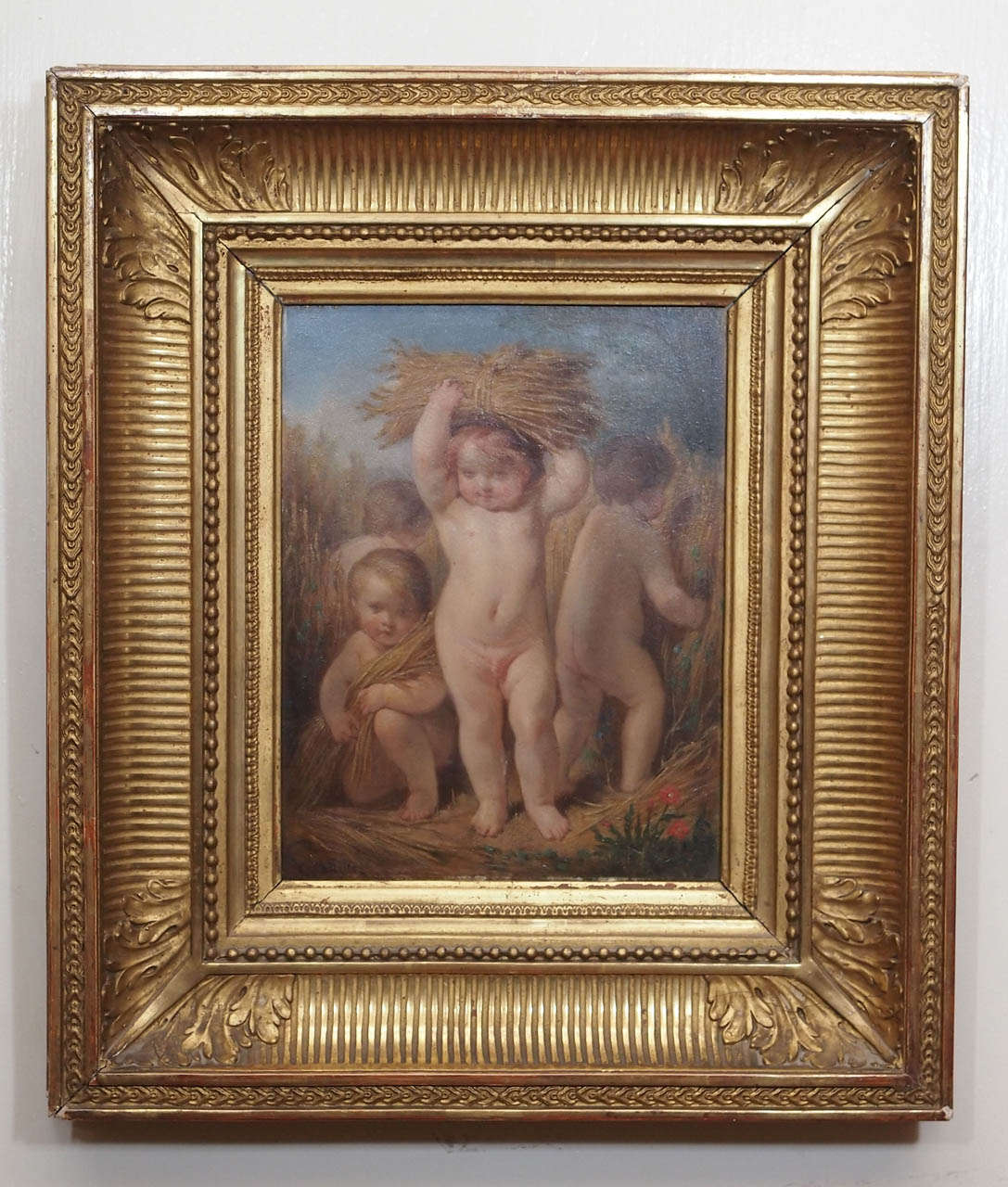 Pair of French Oil on Board  Putti with grapes and wheat 
in Period Gilt frames signed C. Brun