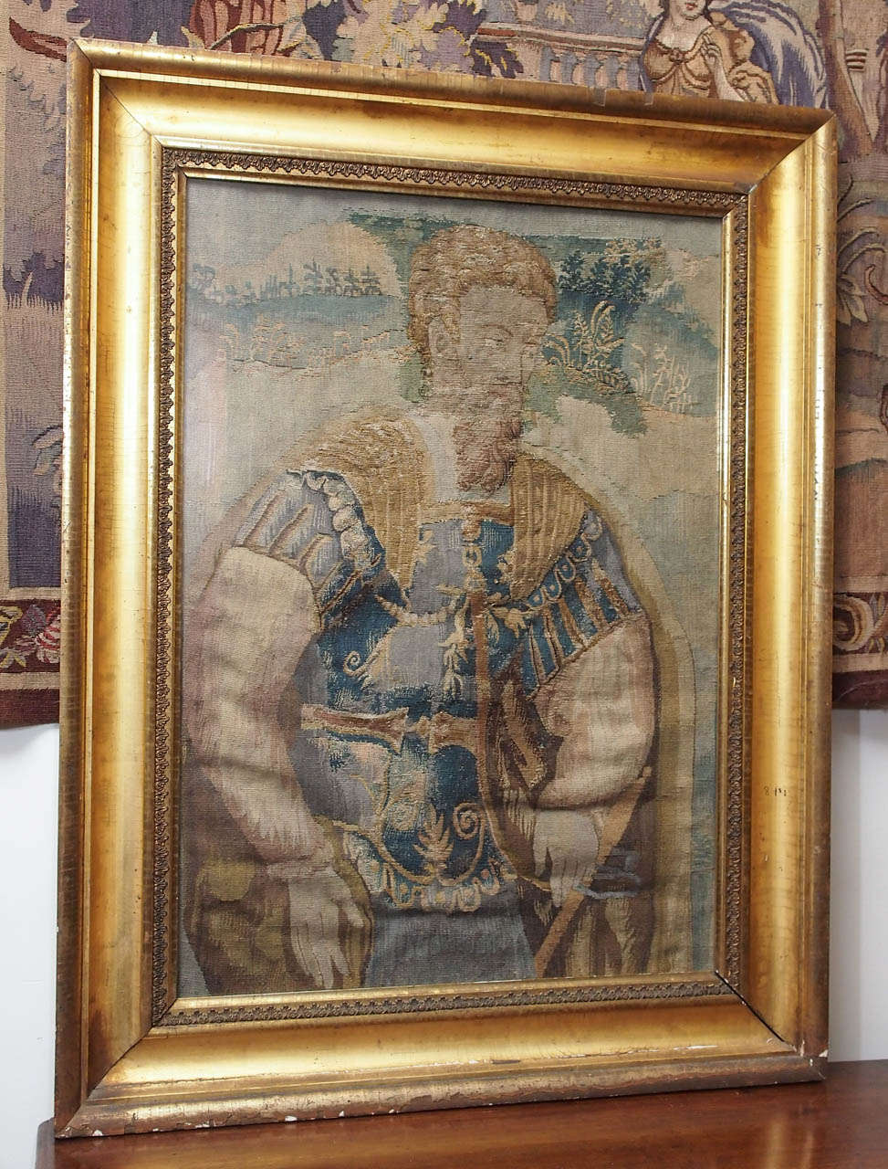 17th c. Flemish Tapestry fragment in 19th c. water gilt frame with glass covering.