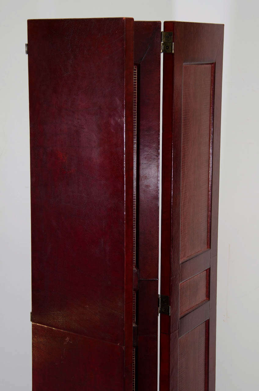 A Mid Century Pair of Leather Folding Screens 1