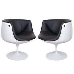 A Mid Century Pair of Half Egg Tulip Swivel Chairs