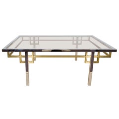 A Mid Century Brass, Chrome, and Glass Coffee Table