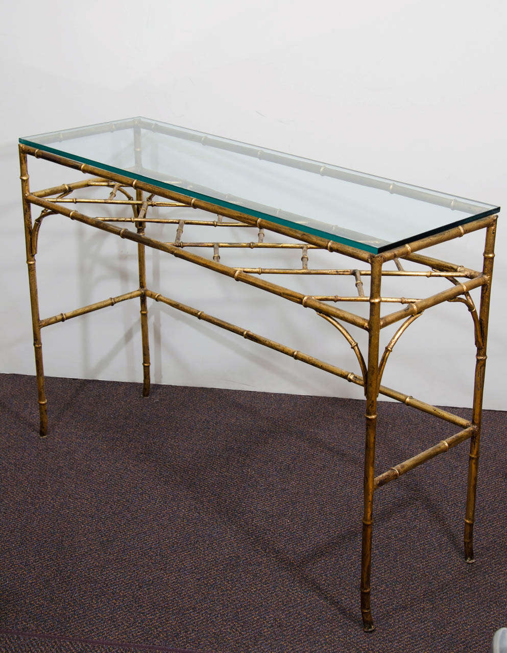 A Mid Century Glass and Faux Bamboo Console Table