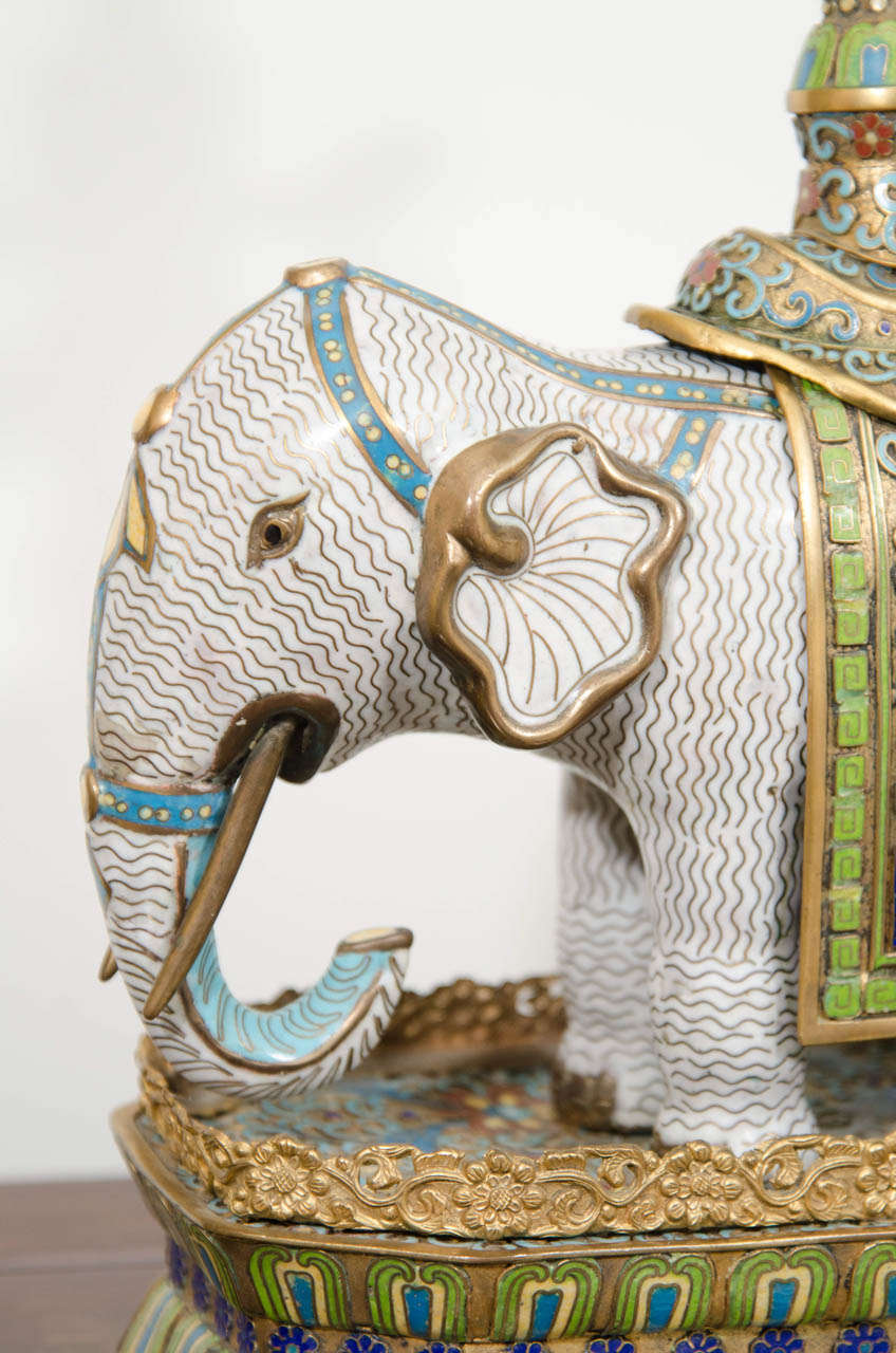 A Pair of Qing Dynasty Gilt Bronze and Cloisonne Elephants 1