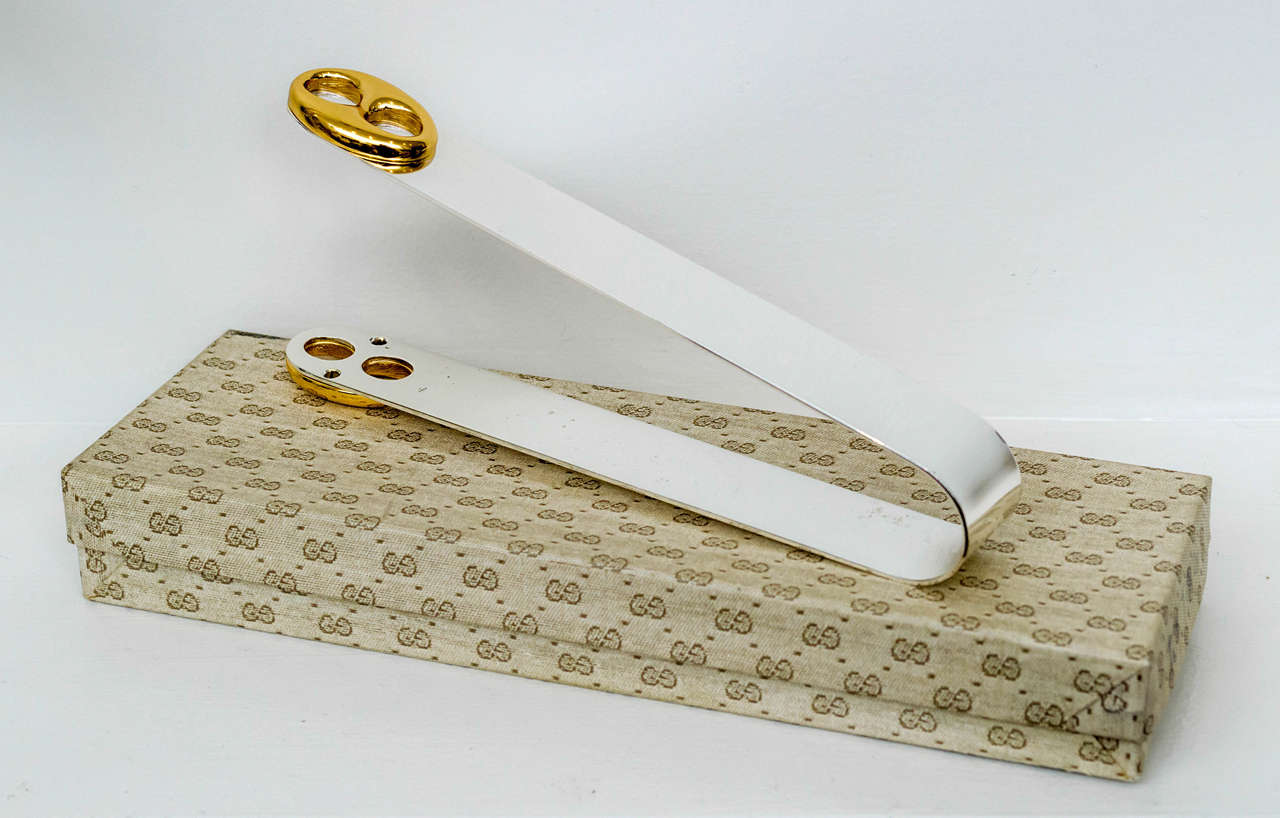 Vintage Gucci Ice tongs with the original box.
