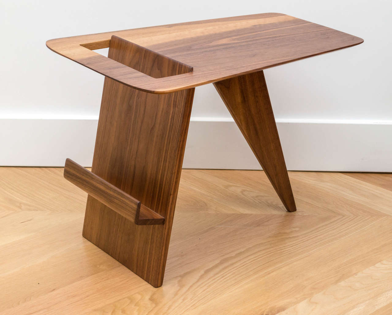 Jens Risom walnut magazine table.
