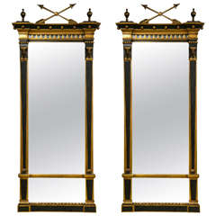 Pair of Ebonized and Gilt Victorian Mirrors with Figural Carvings