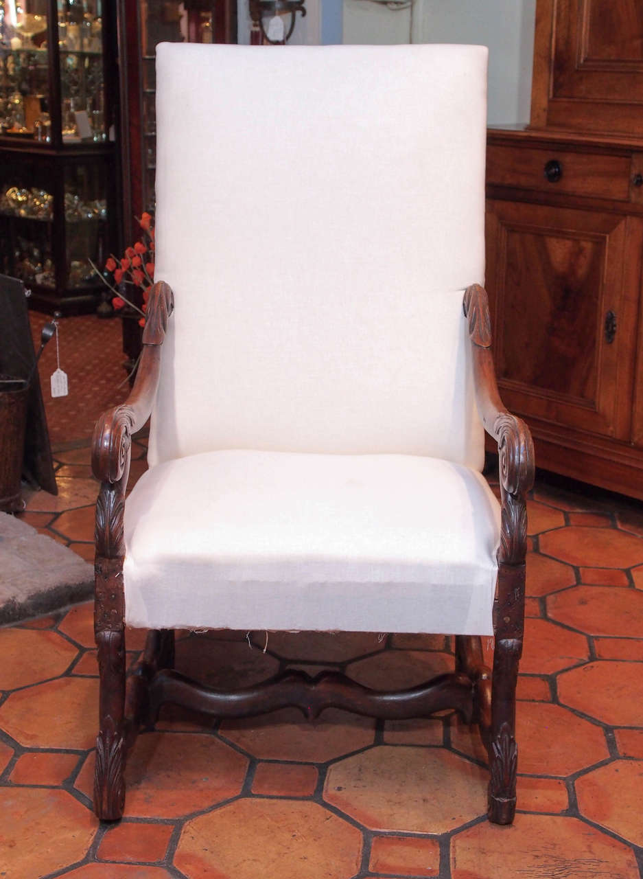 Exceptional French Louis XIII/Louis XIV transition period carved walnut armchair with 