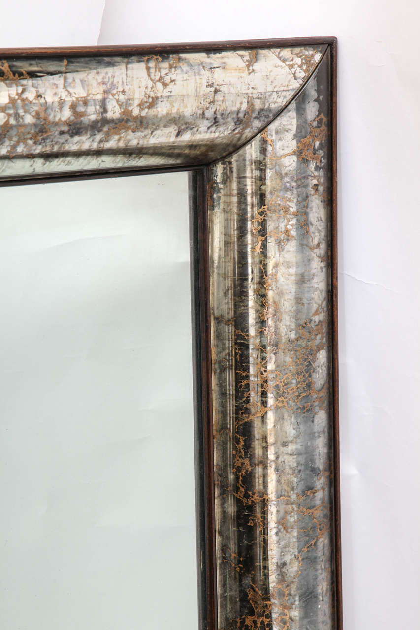 A 1940s Art Moderne mirror attributed to Grosfeld House.