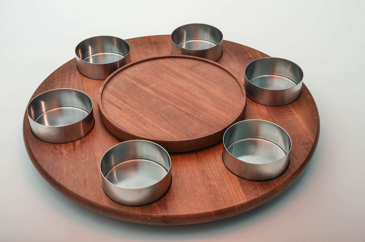 Raised, rotating , circular Teak Serving Tray with Stainless Steel condiment dishes, Danish circa 1965.