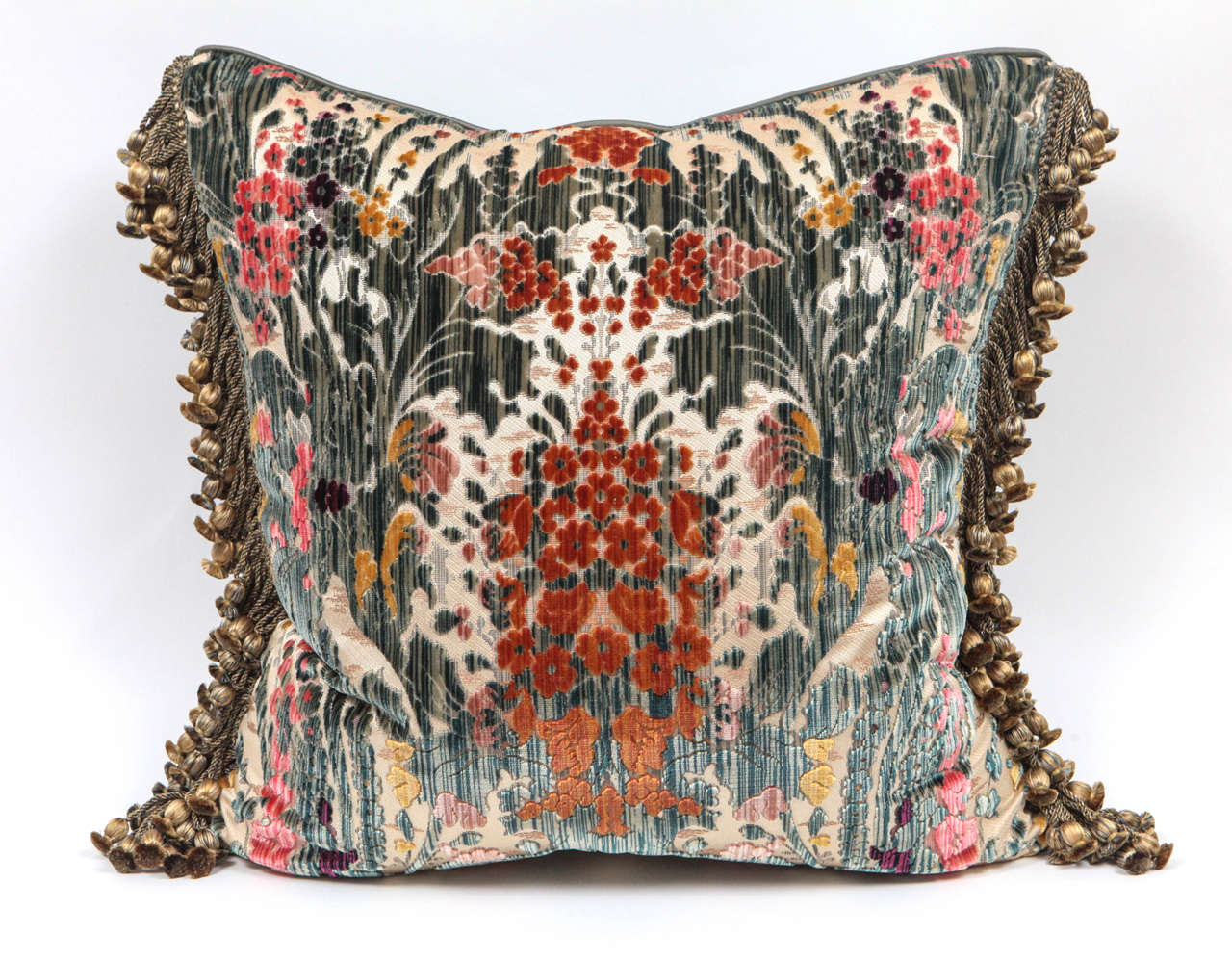 Pair of world-renowned and prominent fabric maker Luigi Bevilacqua Italian silk velvet pillows. Decorative tassel silk trim has been applied to finish the edges. These pillows are sold as a pair.