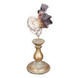 Used Purple oyster on a wood piedestal.