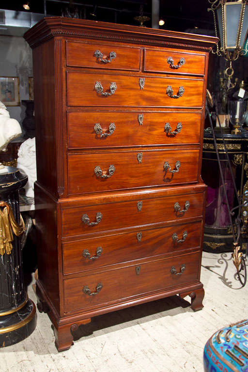 A LIGHT MAHOGANY CHEST ON CHEST WITH OGEE BRACKET FEET AND DENTAL MOLDINGS, FLUTED CORNERS  ON TOP SECTION HAVING  2 SHORT DRAWERS ABOVE  3 LONG DRAWERS, THE BOTTOM  HAVING 3 LONG DRAWERS, POSSIBLY ORIGINAL HARDWARE