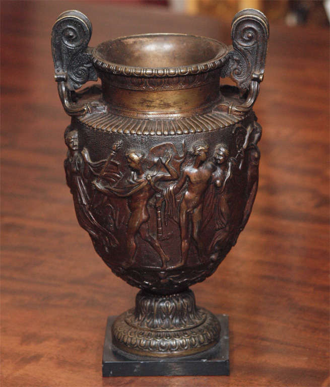 Pair of bronze on black marble bases Grand Tour vase
