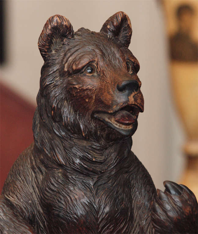Imposing linden wood carved standing bear with glass eyes. carved in the black forest of switzerland