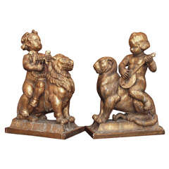 Pair Of Carved Gilt Wood Putto On Lion And Lionesse