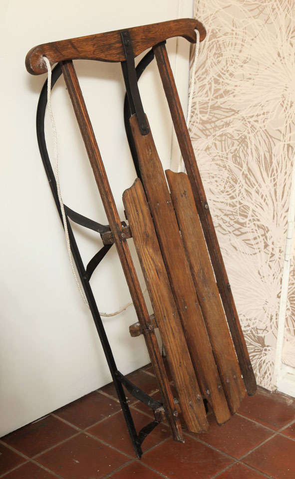 This early 20th Century Antique Snow  Sled has plenty of charm. It is the perfect piece to be placed by the fireplace in your home or lobby decoration, or out on the slopes with the kids... The antique includes an old style steering bar. It's also a