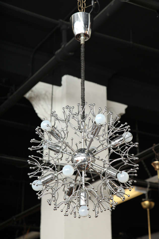 Wonderful chandelier in the shape of a large chrome snow flack, made in Milan in 1960.
 