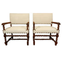 pair linen twist arm chairs