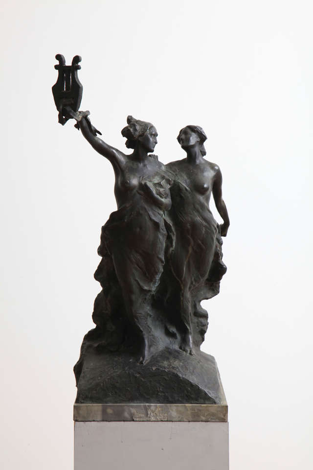 Signed on right side and dated 1907.
Foundry name Fonderia Artistica R .....C (name illegible) on the right back side. 
H. sculpture 26.38 inches (67 cm) with  H. base 1.18 inches (3 cm): 27.56 inches (70 cm).

The lyre that the left muse holds