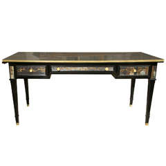 A Fine Ebonized Eglomise Paneled Desk by Maison Jansen