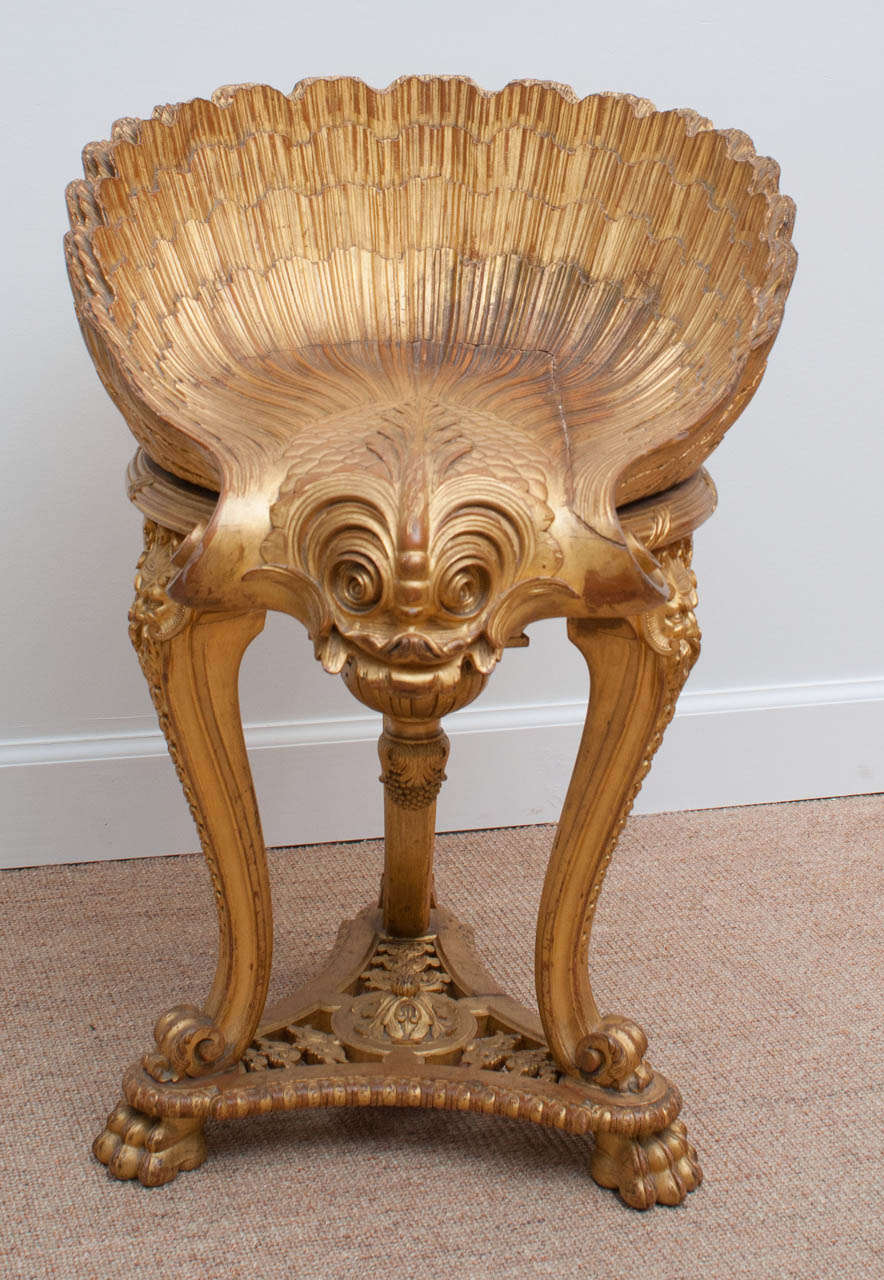 A fine and rare Imperial Russian carved gilt wood harp stool, circa 1900. The stool bears a stamped mark with the Russian Imperial Eagle emblem and translates as follows: 