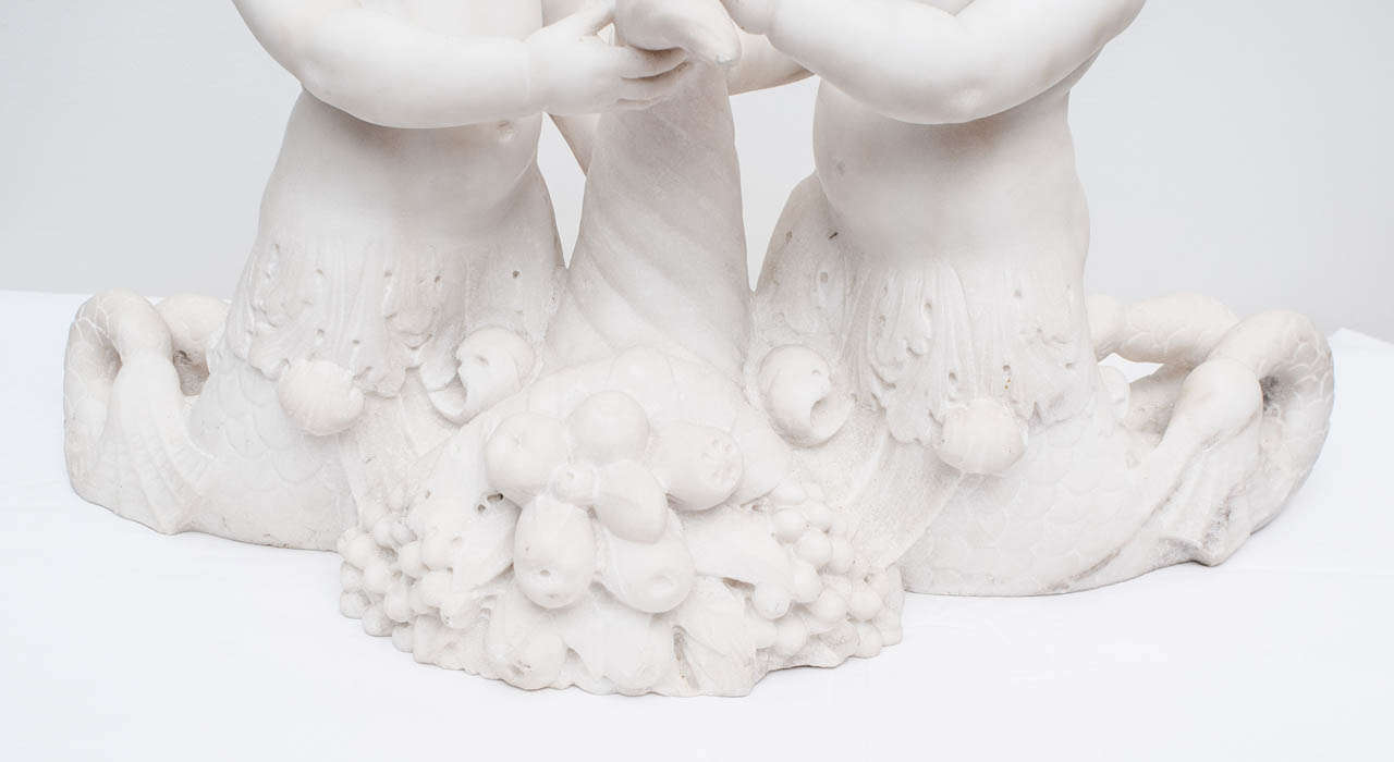 Italian Carved Carrera Marble Dolphin-Tailed Cherubs In Excellent Condition For Sale In Kensington, MD