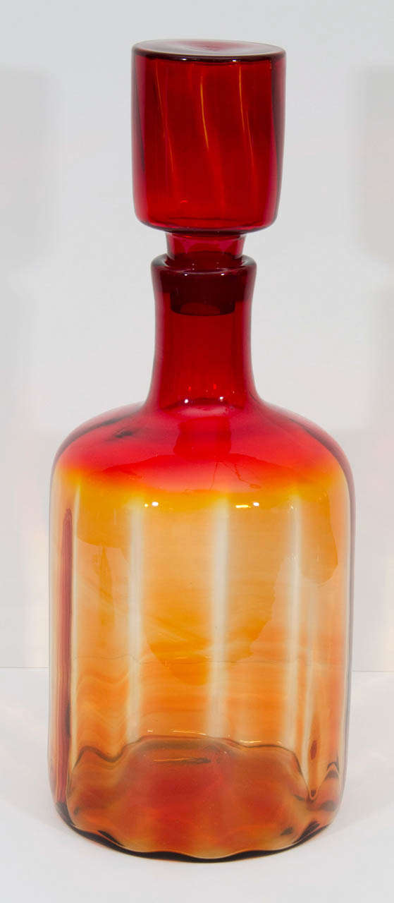 Striking amberina floor decanter by Blenko. The piece is big and beautiful! Please contact for location. 