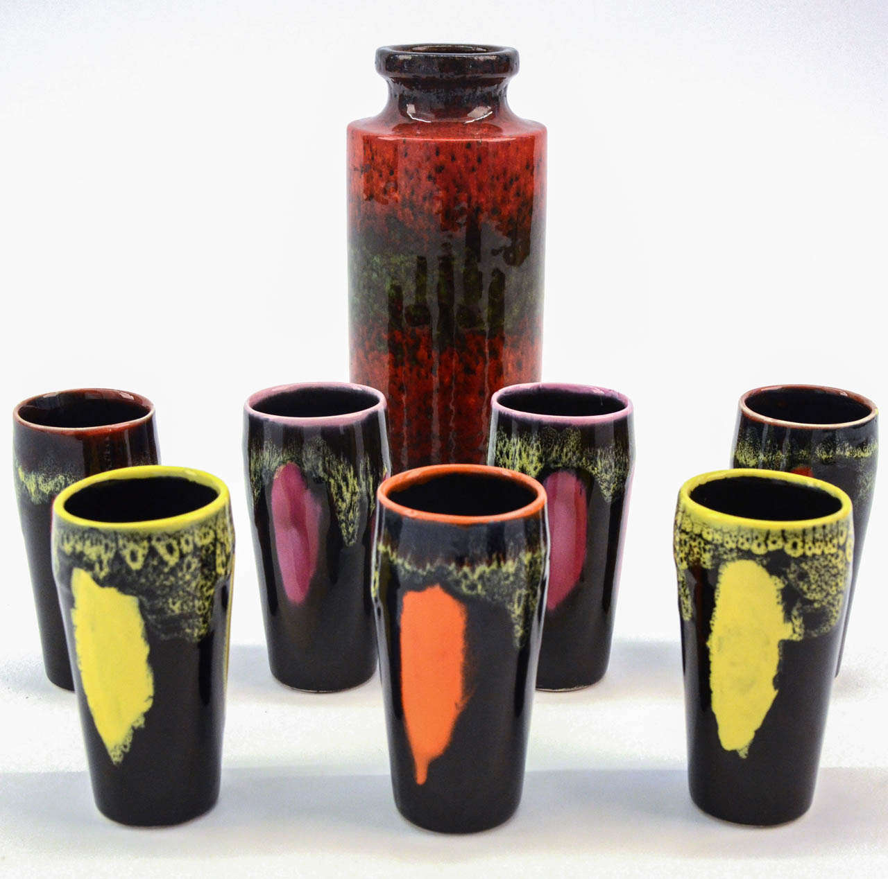 A beautiful mid-century Scheurich West German 'Lava' pottery ceramic colourful drink set of 6.

By Scheurich Keramik 