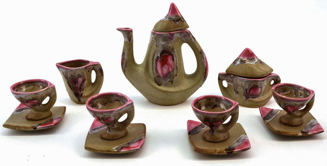 A fine example of vintage 1970s Vallauris pottery ceramic 7 pieces beige and pink coffee set. 
