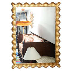 An Italian Mirror with Carved Wood Scalloped Edge