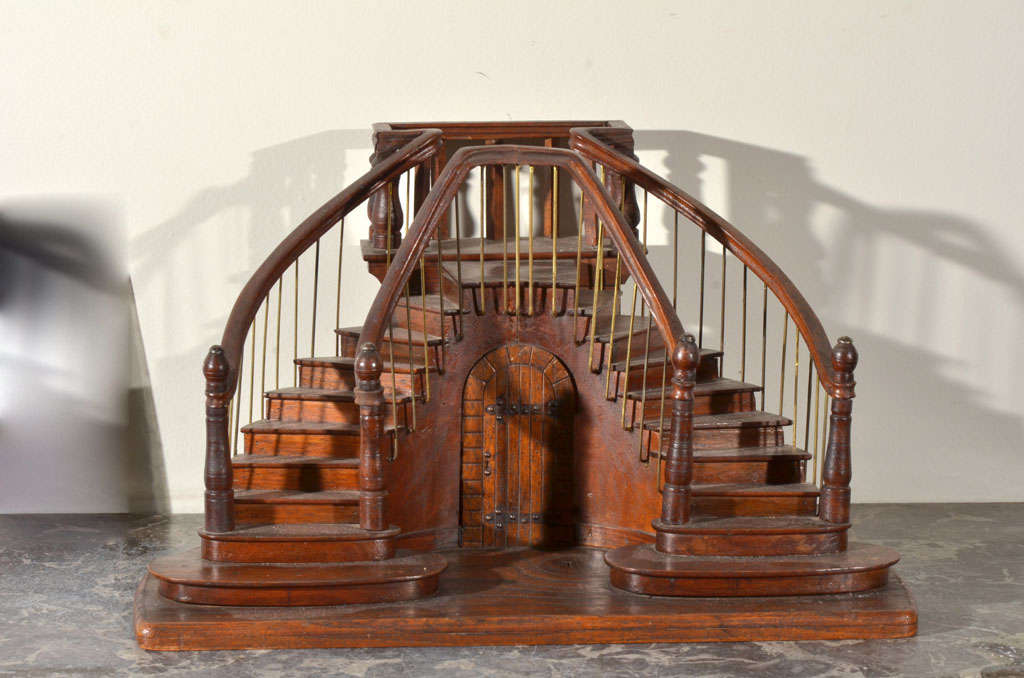 Intricately made miniature staircase model with metal balusters and a faux doorway underneath.  Piece is signed and dated as seen in Image #8.  This was the work of a Compagnon, a member of a french guild that dates back to the Middle Ages.