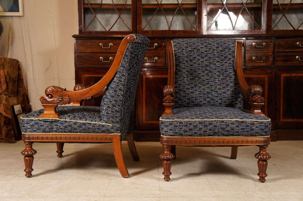 Pair of handsome armchairs, mid 19th century from Denmark with mahogany frames and armrests carved with mythical beast heads
and legs with gadrooned rondels. New upholstery