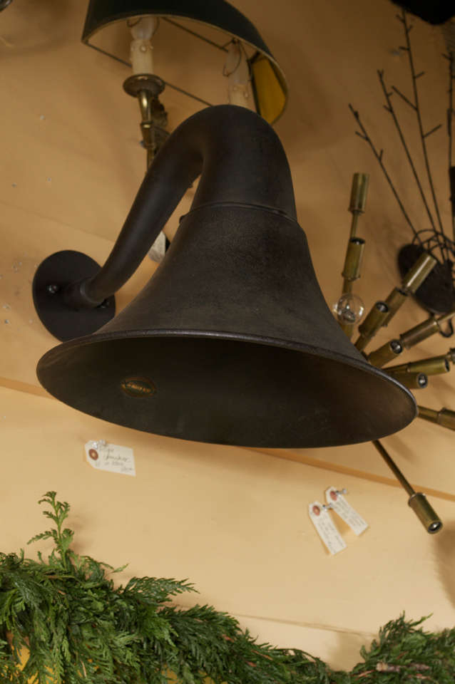 This horn was first used as the horn speaker for the Atwater Kent Radio Horn in 1925 and has been repurposed into a charming wall sconce. This has been newly wired and has a single downlight with porcelain socket. 