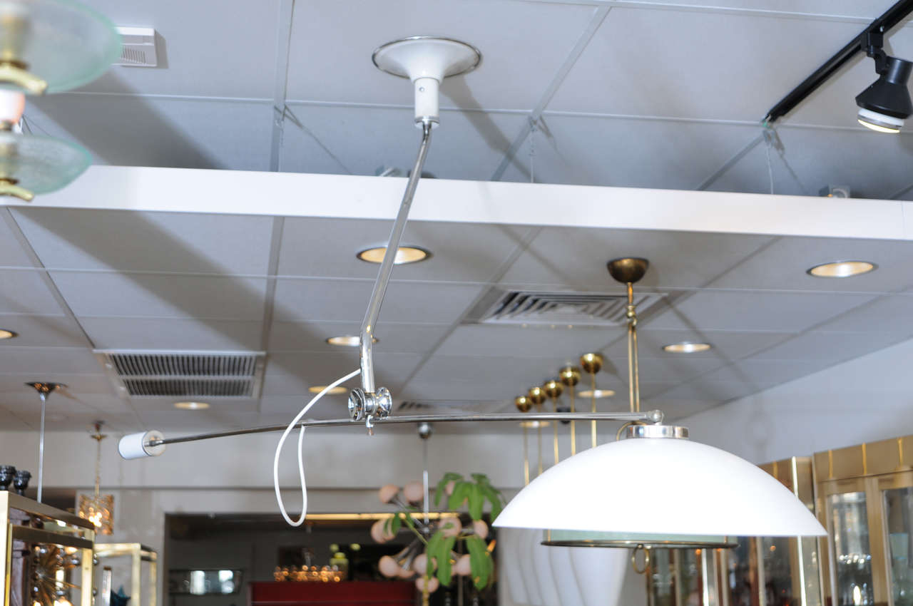 This perfectly balanced light articulates in multiple ways to provide illumination and chic design.

Measures: 15