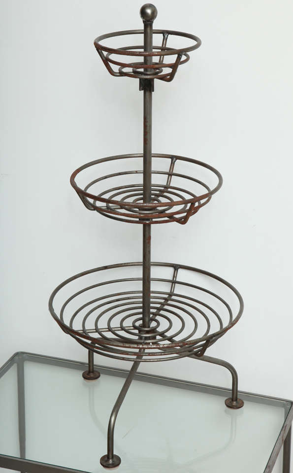 Three tiered dessert/Fruit stand on tripod base.