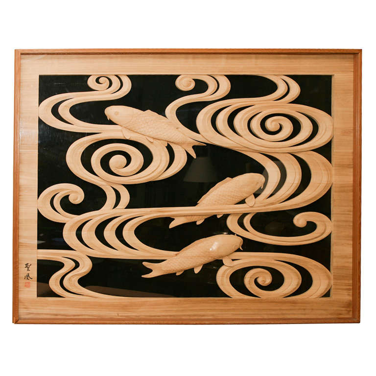 Japanese wood carving panel of swimming carp.