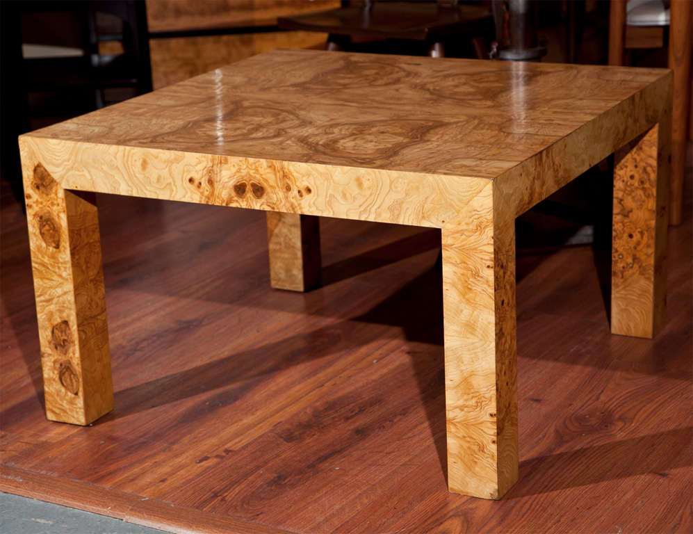 A burl elmwood coffee table by American Milo Ray Baughman.