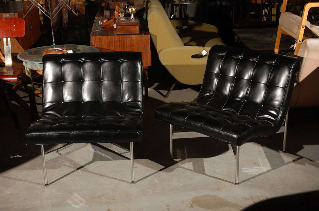 Black leather & chrome lounge chairs w/tufted seats & backs from the Architectural Group One series