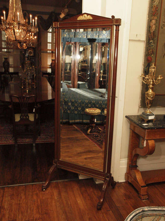 Antique French Empire cheval mirror.