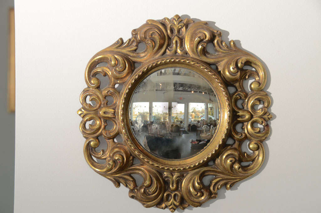 Beautiful frame gilded plaster worked highly, inspired Louis XV, convex mirror called 