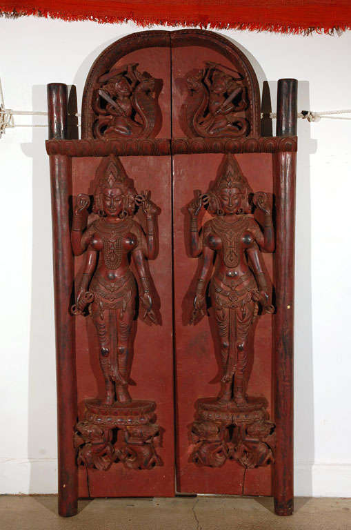 Intricate carved door with Hindu Goddess carving on each sides.
Could be used as a hanging wall sculptures or as doors.

Balinese Goddess.

Mosaik provides Antiques,Art Deco, Moorish Style, Spanish, African, Islamic Art, Arabian, Middle