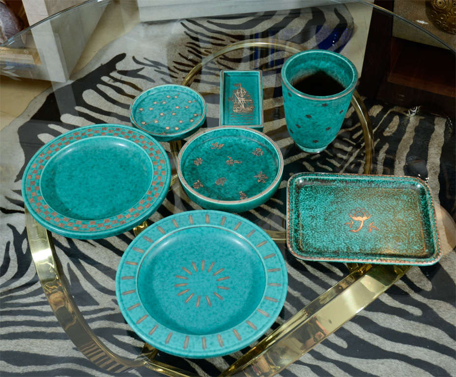 Swedish art deco ceramics by Wilhelm Kage, by Gustavsberg, Sweden. The group is called Argenta, from the 1930's. Rectangular bowl, $950, two round bowls, each $950. Vase $950. Small with Wasa ship, $250. Two smaller bowls are SOLD, but we have more.