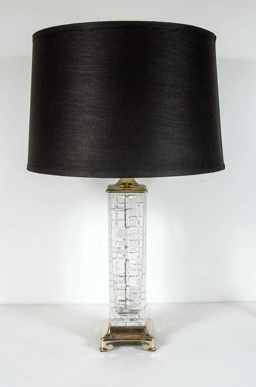 This brilliant pair of Mid-Century Modernist table lamps feature a crystal base with an etched cross-hatch design supported by a solid brass pagoda style base. This elegant pair of lamps are also signed Dresden. Newly rewired and include new custom