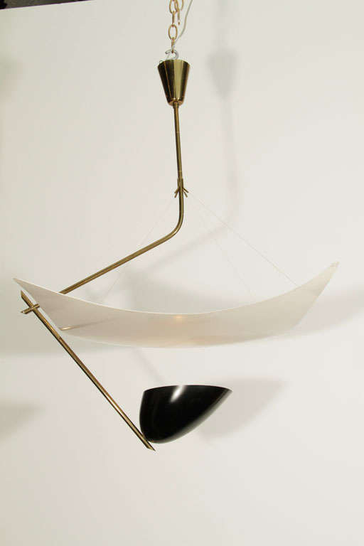 Iconic and rare lamp made of enameled aluminum, brass, monofilament line.   Design reminiscent of a kite.  Very elegant and beautiful.