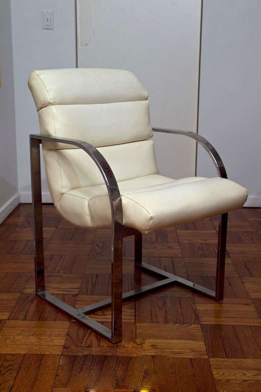 MILO BAUGHMAN/ THAYER-COGGIN  SET OF 4 ARMCHAIRS WITH CHANNELED WHITE LEATHER UPHOLSTERY ON POLISHED STEEL FRAMES. THAYER-COGGIN PAPER  LABEL