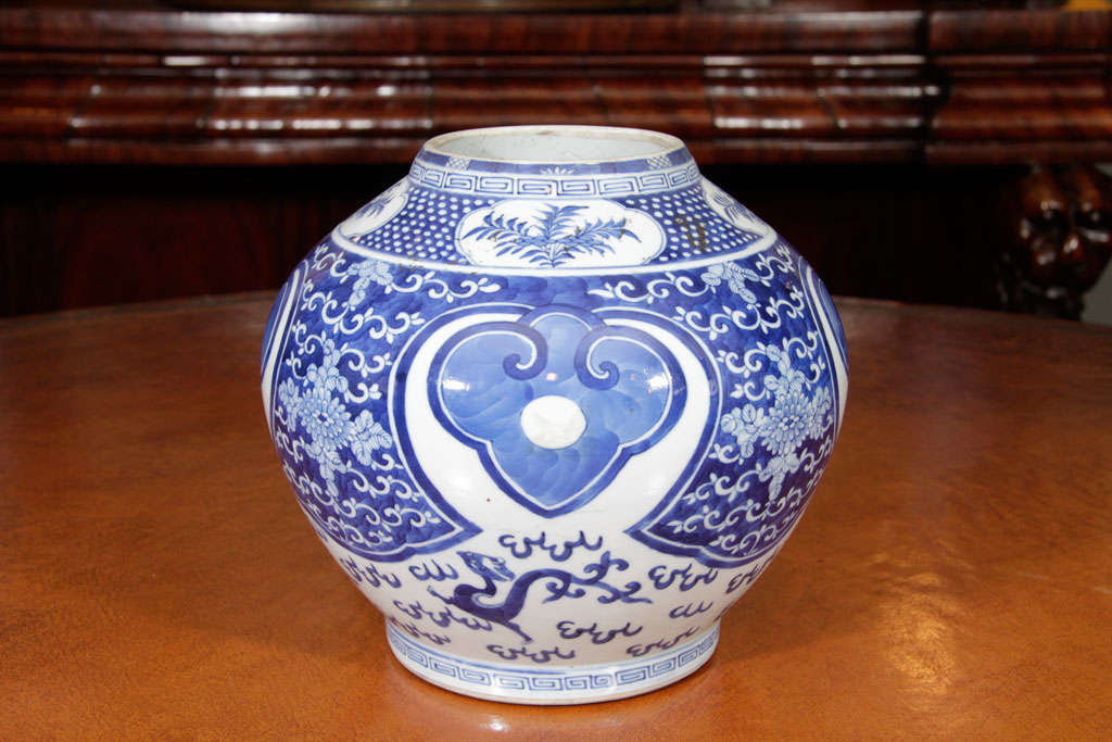 A Chinese blue and white porcelain jar with an abstract design.