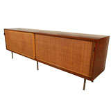 Early Florence Knoll walnut credenza with cane doors