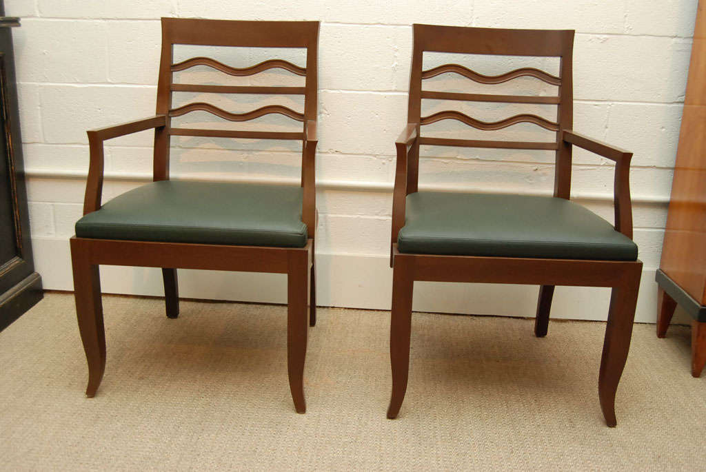 American A Pair of Walnut Arm Chairs For Sale