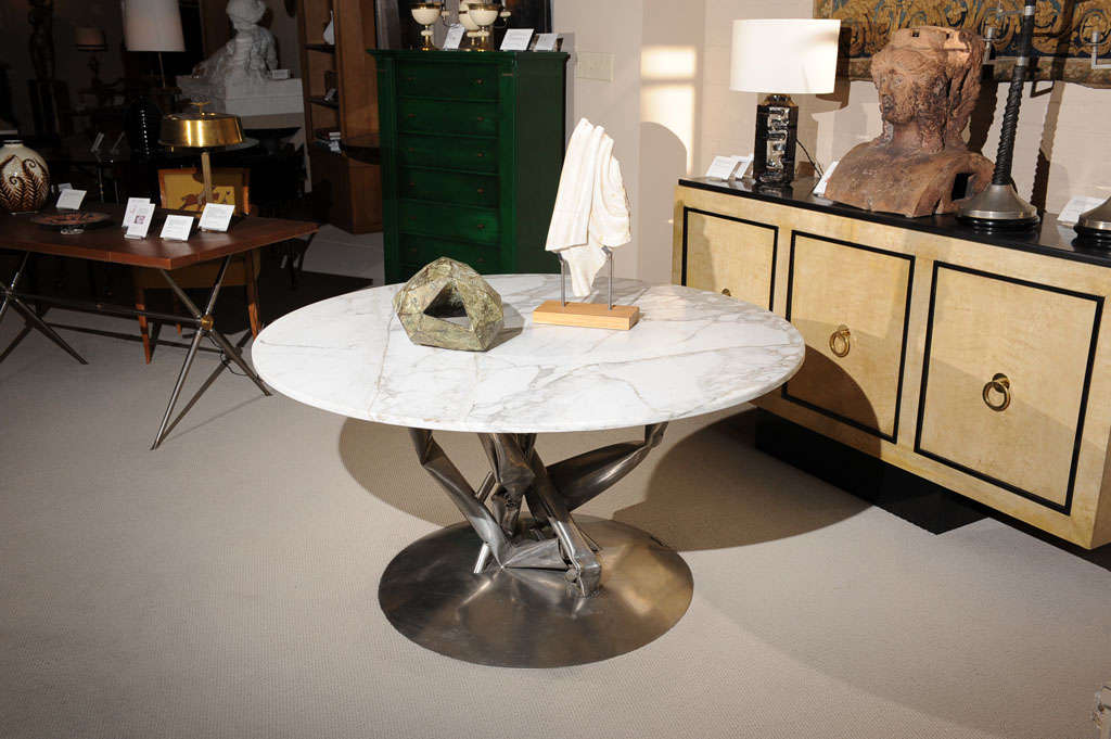 An exceptional and highly unique table by Albert Feraud with welded and molded stainless-steel base and Carrara marble top.
Signed on the base - A. Feraud - circa 1970 - France