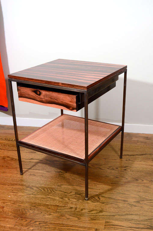 Pair of ebony, cane and oiled bronze bedside tables In Excellent Condition In New York, NY